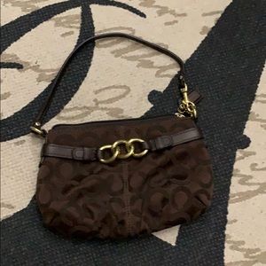 Coach brown wristlet. Barely used. Great shape.